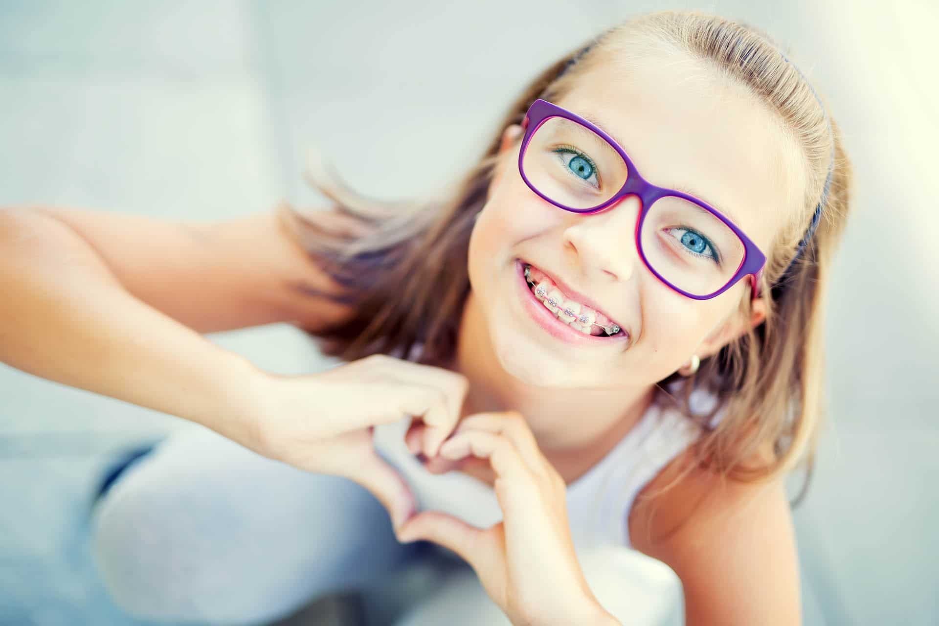 Young girl with braces.